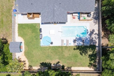 Dive into your own private oasis! This is your chance to own an on Founders Club At St. James Plantation in North Carolina - for sale on GolfHomes.com, golf home, golf lot