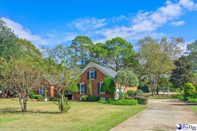 Discover your dream home nestled on over half an acre in the on Country Club of South Carolina in South Carolina - for sale on GolfHomes.com, golf home, golf lot