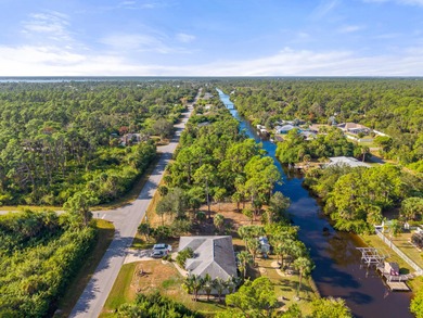 Build your dream home on this beautiful waterfront lot in a on Sabal Trace Golf and Country Club in Florida - for sale on GolfHomes.com, golf home, golf lot