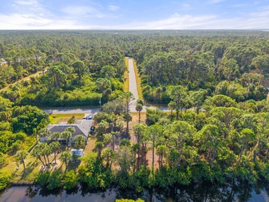 Build your dream home on this beautiful waterfront lot in a on Sabal Trace Golf and Country Club in Florida - for sale on GolfHomes.com, golf home, golf lot