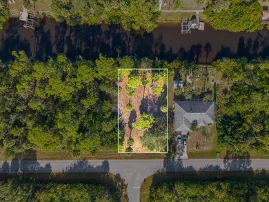 Build your dream home on this beautiful waterfront lot in a on Sabal Trace Golf and Country Club in Florida - for sale on GolfHomes.com, golf home, golf lot