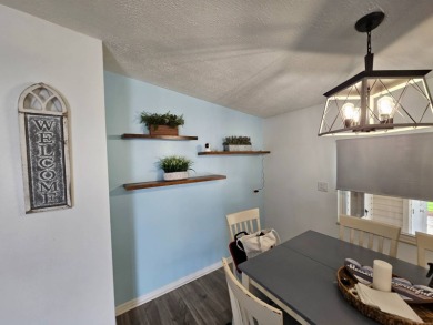 This home is located on leased land in a 55+ resort-style MH on Big Cypress Golf and Country Club in Florida - for sale on GolfHomes.com, golf home, golf lot
