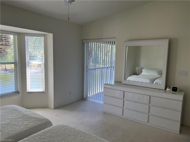 What a fabulous veranda with a lot of natural light, this 2 on Naples Heritage Golf and Country Club in Florida - for sale on GolfHomes.com, golf home, golf lot