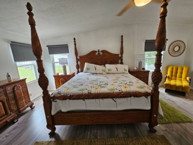 This home is located on leased land in a 55+ resort-style MH on Big Cypress Golf and Country Club in Florida - for sale on GolfHomes.com, golf home, golf lot