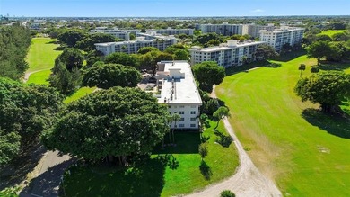 Rarely available 2-bedroom, 1-bath corner unit offering on Palm-Aire Country Club and Resort - The Oaks in Florida - for sale on GolfHomes.com, golf home, golf lot