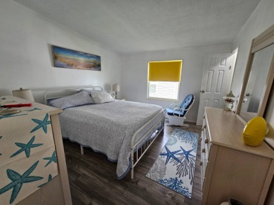 This home is located on leased land in a 55+ resort-style MH on Big Cypress Golf and Country Club in Florida - for sale on GolfHomes.com, golf home, golf lot