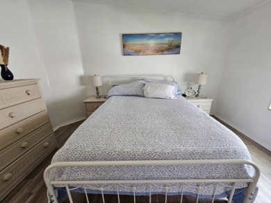 This home is located on leased land in a 55+ resort-style MH on Big Cypress Golf and Country Club in Florida - for sale on GolfHomes.com, golf home, golf lot