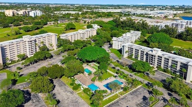 Rarely available 2-bedroom, 1-bath corner unit offering on Palm-Aire Country Club and Resort - The Oaks in Florida - for sale on GolfHomes.com, golf home, golf lot