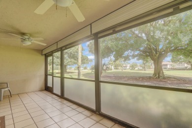 Corner first-floor unit with breathtaking golf course views! on The Golf Club of Jupiter in Florida - for sale on GolfHomes.com, golf home, golf lot