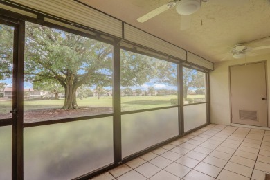 Corner first-floor unit with breathtaking golf course views! on The Golf Club of Jupiter in Florida - for sale on GolfHomes.com, golf home, golf lot