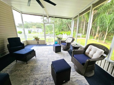 This home is located on leased land in a 55+ resort-style MH on Big Cypress Golf and Country Club in Florida - for sale on GolfHomes.com, golf home, golf lot