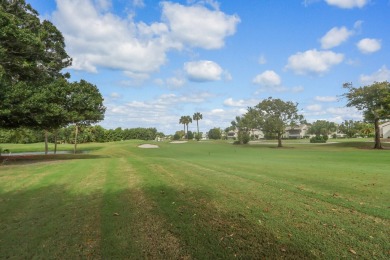 Corner first-floor unit with breathtaking golf course views! on The Golf Club of Jupiter in Florida - for sale on GolfHomes.com, golf home, golf lot