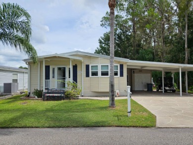 This home is located on leased land in a 55+ resort-style MH on Big Cypress Golf and Country Club in Florida - for sale on GolfHomes.com, golf home, golf lot