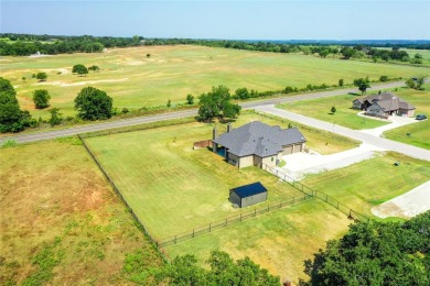 A MUST SEE! This wonderful 2020-built home, located in the on Bridgeport Country Club in Texas - for sale on GolfHomes.com, golf home, golf lot