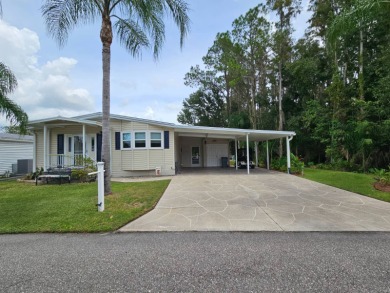 This home is located on leased land in a 55+ resort-style MH on Big Cypress Golf and Country Club in Florida - for sale on GolfHomes.com, golf home, golf lot