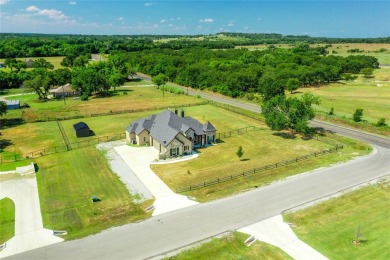 A MUST SEE! This wonderful 2020-built home, located in the on Bridgeport Country Club in Texas - for sale on GolfHomes.com, golf home, golf lot