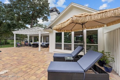 Discover your dream home in the exclusive Queens Harbour Yacht & on Queens Harbour Yacht and Country Club in Florida - for sale on GolfHomes.com, golf home, golf lot