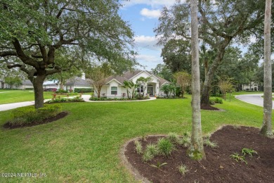 Discover your dream home in the exclusive Queens Harbour Yacht & on Queens Harbour Yacht and Country Club in Florida - for sale on GolfHomes.com, golf home, golf lot