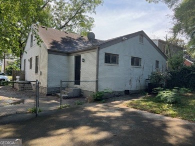 East Atlanta Deal:  This four side brick single family house was on East Lake Golf Club in Georgia - for sale on GolfHomes.com, golf home, golf lot