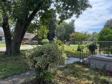 East Atlanta Deal:  This four side brick single family house was on East Lake Golf Club in Georgia - for sale on GolfHomes.com, golf home, golf lot