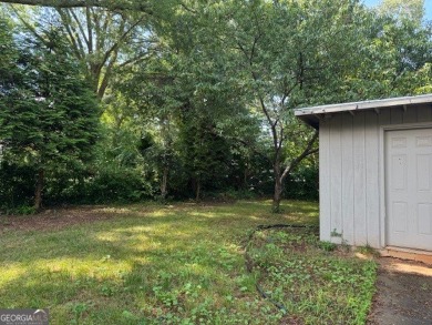 East Atlanta Deal:  This four side brick single family house was on East Lake Golf Club in Georgia - for sale on GolfHomes.com, golf home, golf lot
