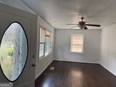 East Atlanta Deal:  This four side brick single family house was on East Lake Golf Club in Georgia - for sale on GolfHomes.com, golf home, golf lot