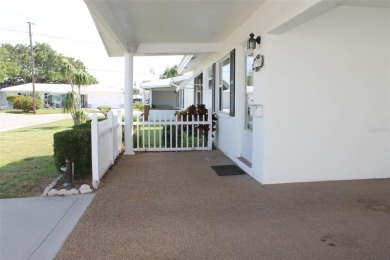 This single-family home located in Unit 2 of Mainlands by the on Mainlands Golf Club in Florida - for sale on GolfHomes.com, golf home, golf lot