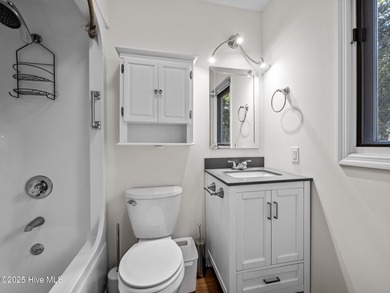 Gorgeous home located on the 9th fairway of the Country Club of on The Country Club of the Crystal Coast in North Carolina - for sale on GolfHomes.com, golf home, golf lot