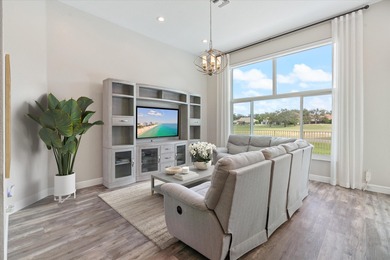 Truly turnkey and stunning 4-bedroom, plus den, 2-bathroom home on TPC Eagle Trace in Florida - for sale on GolfHomes.com, golf home, golf lot