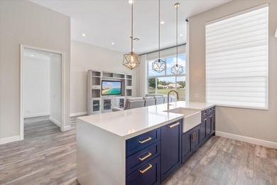 Truly turnkey and stunning 4-bedroom, plus den, 2-bathroom home on TPC Eagle Trace in Florida - for sale on GolfHomes.com, golf home, golf lot