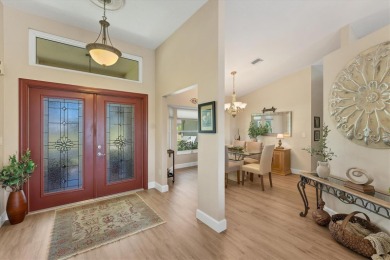 CASUAL ELEGANCE MEETS FLORIDA TRANQUILITY IN THIS FORMER MODEL on Rotonda Golf and Country Club The Palms Course in Florida - for sale on GolfHomes.com, golf home, golf lot