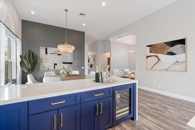 Truly turnkey and stunning 4-bedroom, plus den, 2-bathroom home on TPC Eagle Trace in Florida - for sale on GolfHomes.com, golf home, golf lot