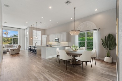 Truly turnkey and stunning 4-bedroom, plus den, 2-bathroom home on TPC Eagle Trace in Florida - for sale on GolfHomes.com, golf home, golf lot