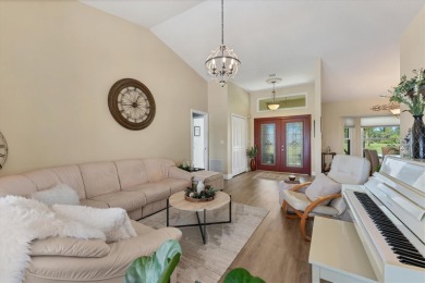 CASUAL ELEGANCE MEETS FLORIDA TRANQUILITY IN THIS FORMER MODEL on Rotonda Golf and Country Club The Palms Course in Florida - for sale on GolfHomes.com, golf home, golf lot