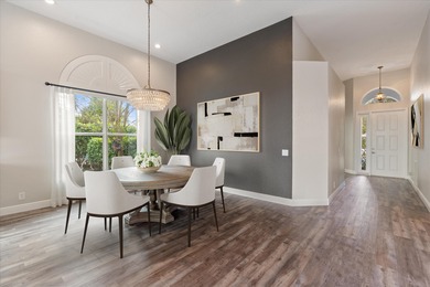 Truly turnkey and stunning 4-bedroom, plus den, 2-bathroom home on TPC Eagle Trace in Florida - for sale on GolfHomes.com, golf home, golf lot