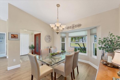 CASUAL ELEGANCE MEETS FLORIDA TRANQUILITY IN THIS FORMER MODEL on Rotonda Golf and Country Club The Palms Course in Florida - for sale on GolfHomes.com, golf home, golf lot