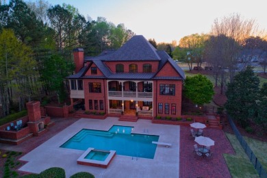 This custom-built European lakefront home is located in Oak on Oak Mountain Championship Golf Club in Georgia - for sale on GolfHomes.com, golf home, golf lot