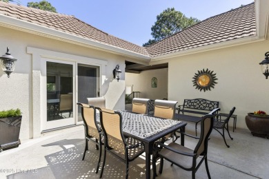 This amazing Mediterranean style home on the Egret 6th tee box on Carolina National Golf Club in North Carolina - for sale on GolfHomes.com, golf home, golf lot