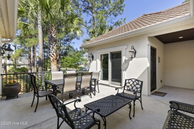 This amazing Mediterranean style home on the Egret 6th tee box on Carolina National Golf Club in North Carolina - for sale on GolfHomes.com, golf home, golf lot