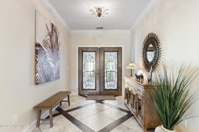 This amazing Mediterranean style home on the Egret 6th tee box on Carolina National Golf Club in North Carolina - for sale on GolfHomes.com, golf home, golf lot