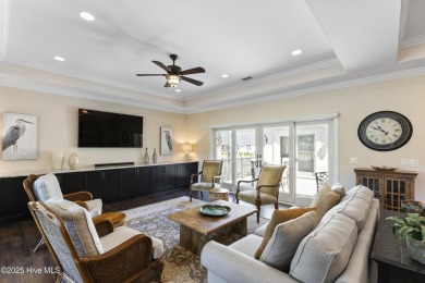 This amazing Mediterranean style home on the Egret 6th tee box on Carolina National Golf Club in North Carolina - for sale on GolfHomes.com, golf home, golf lot