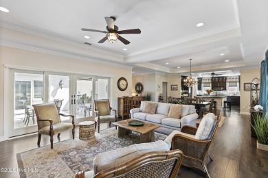 This amazing Mediterranean style home on the Egret 6th tee box on Carolina National Golf Club in North Carolina - for sale on GolfHomes.com, golf home, golf lot