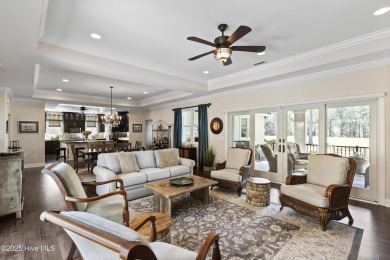 This amazing Mediterranean style home on the Egret 6th tee box on Carolina National Golf Club in North Carolina - for sale on GolfHomes.com, golf home, golf lot