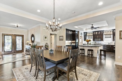 This amazing Mediterranean style home on the Egret 6th tee box on Carolina National Golf Club in North Carolina - for sale on GolfHomes.com, golf home, golf lot