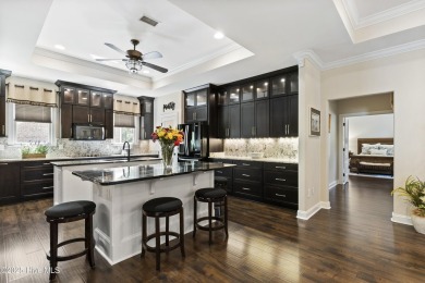 This amazing Mediterranean style home on the Egret 6th tee box on Carolina National Golf Club in North Carolina - for sale on GolfHomes.com, golf home, golf lot