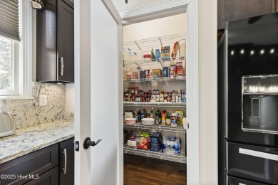 This amazing Mediterranean style home on the Egret 6th tee box on Carolina National Golf Club in North Carolina - for sale on GolfHomes.com, golf home, golf lot