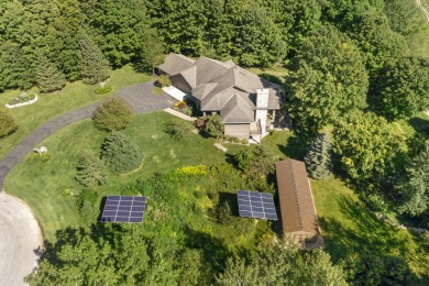 Custom-designed cedar home on over 7.5 acres with 600' of on Bear Lake Highlands Golf Course in Michigan - for sale on GolfHomes.com, golf home, golf lot