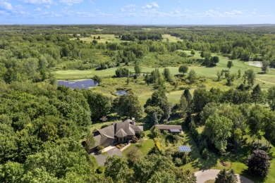 Custom-designed cedar home on over 7.5 acres with 600' of on Bear Lake Highlands Golf Course in Michigan - for sale on GolfHomes.com, golf home, golf lot