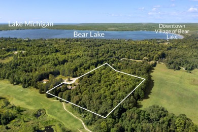 Custom-designed cedar home on over 7.5 acres with 600' of on Bear Lake Highlands Golf Course in Michigan - for sale on GolfHomes.com, golf home, golf lot