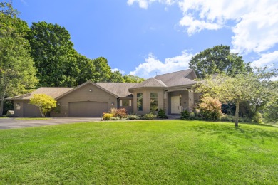 Custom-designed cedar home on over 7.5 acres with 600' of on Bear Lake Highlands Golf Course in Michigan - for sale on GolfHomes.com, golf home, golf lot